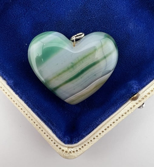 Large Banded Agate Heart Design Necklace Pendant: Large Banded Agate Heart Design Necklace Pendant. Measures nearly 1.75 inches in width.