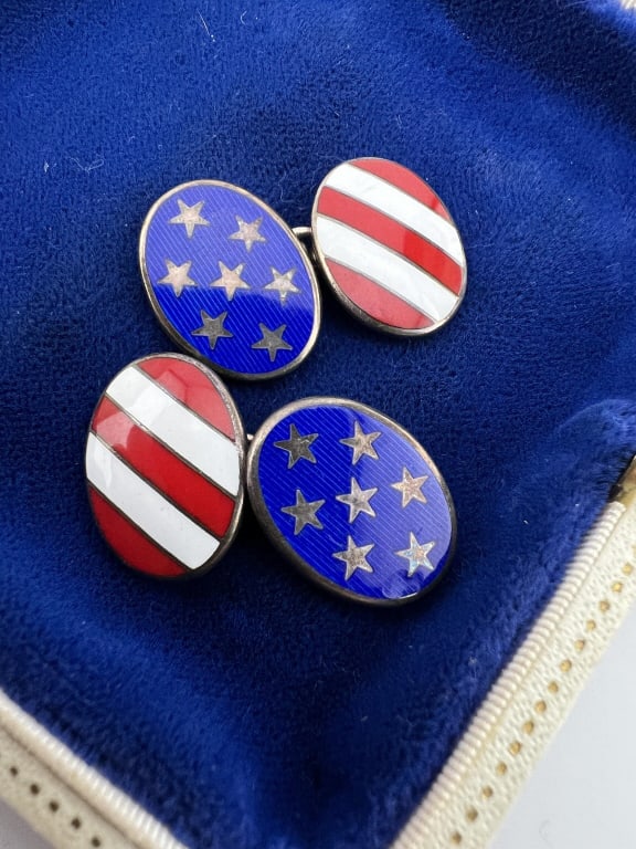 Pair of English Sterling & Enamel Cuff Links: Pair of English Sterling & Enamel Cuff Links. Sterling silver and red, white and blue flag motif enamel decorated. English hallmarks. Each oval plaque measures .75 of an inch in length.