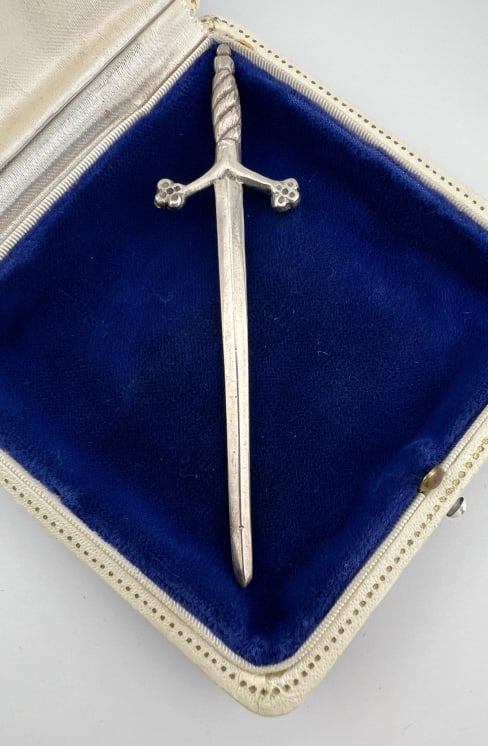 Antique Scottish Silver Large Scale Sword Pendant: Antique Scottish Silver Large Scale Sword Pendant. Necklace pendant, stamped SCOTLAND on the back, measures 3.75 inches in length.
