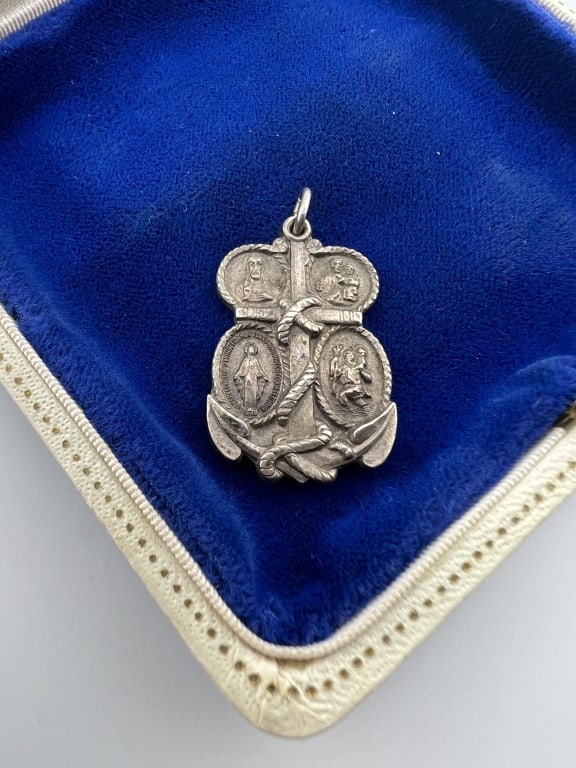 Antique Sterling Religious Pendant w Ship Anchor: Antique Sterling Silver Catholic Religious Pendant w Ship Anchor Motif. Hallmarked. Measures nearly 1.5 inches in length.