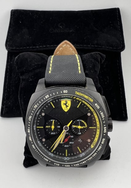 Ferrari Scuderia Aero Evo Chronograph Wrist Watch: Ferrari Scuderia Aero Evo Chronograph Wrist Watch. Face measures just under 2 inches in diameter. Together with an Omega dust cover and black form.