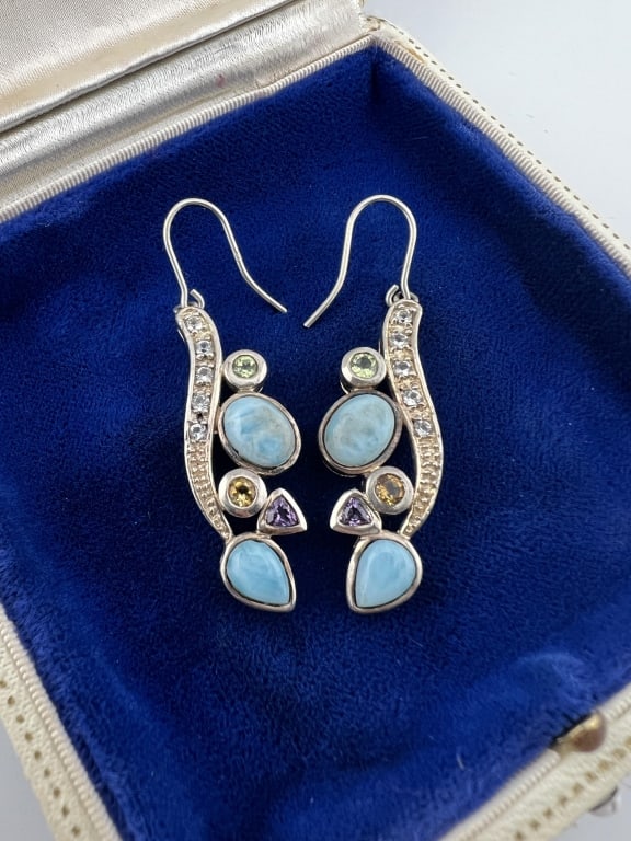Pair of Sterling Silver & Larimar Pendant Earrings: Pair of Sterling Silver & Larimar Pendant Earrings. Hallmarked on the backs. With additional accent stones. Each measures approximately 2 inches in length.