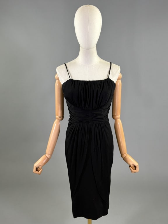 Vintage 1950s Jersey Knit Ruched Cocktail Dress: Vintage 1950s Jersey Knit Ruched Cocktail Dress having ruched details throughout with center back zip closure, fully lined. Measuring 34 inch bust, 28 - 30 inch waist, 38 inches long. Wear and small h