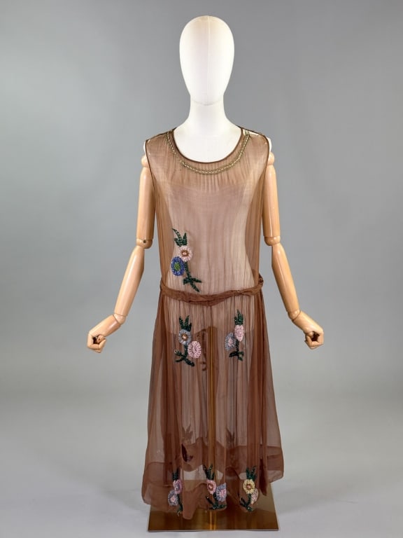 Antique 1920s Chiffon Floral Beaded Flapper Dress: Antique 1920s Chiffon Floral Beaded Flapper Dress having glass beading throughout with drop waist, no closures slides over head. Measuring 38 inch bust, 34 inch drop waist, 45 inches long. Wear throug