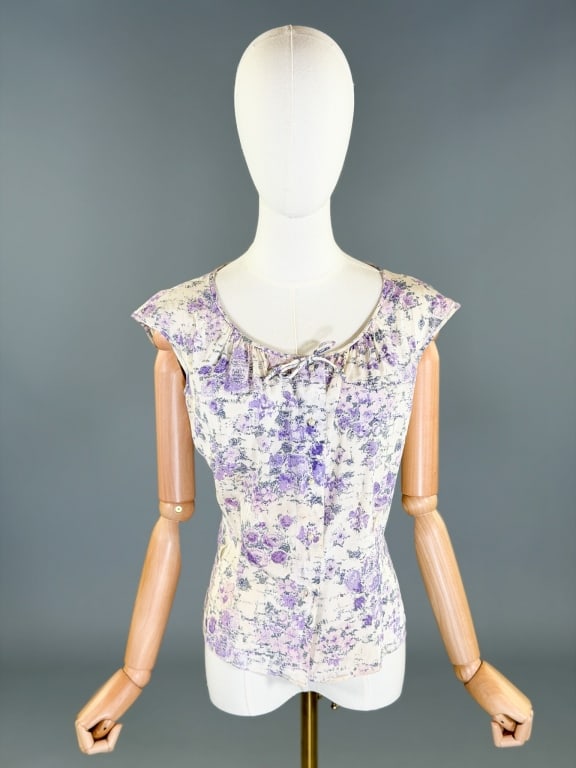 Vintage 1950s Floral Print Blouse Top Shirt: Vintage 1950s Floral Print Blouse Top Shirt having button front closure and print throughout. Measuring 42 inch bust, 34 inch waist, 21 inches long. General wear throughout as shown.