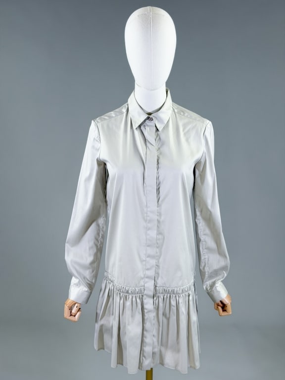Vintage Prada Cotton Drop Waist Shirt Dress: Vintage Prada Cotton Drop Waist Shirt Dress having button front closure. Marked size 38. Measuring 36 inch bust, 36 inch waist, 33 inches long, 24 inch sleeve length. General wear as shown throughout.