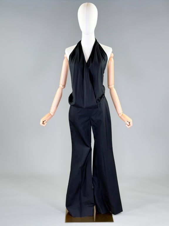 Vintage Chloe Silk Wool Halter One Piece Jumpsuit: Vintage Chloe Silk Wool Halter One Piece Jumpsuit having halter neck with adjustable metal buckle and center back zip closure in pants. Labeled Chloe - marked size 36. Measuring free bust, 30 inch wai