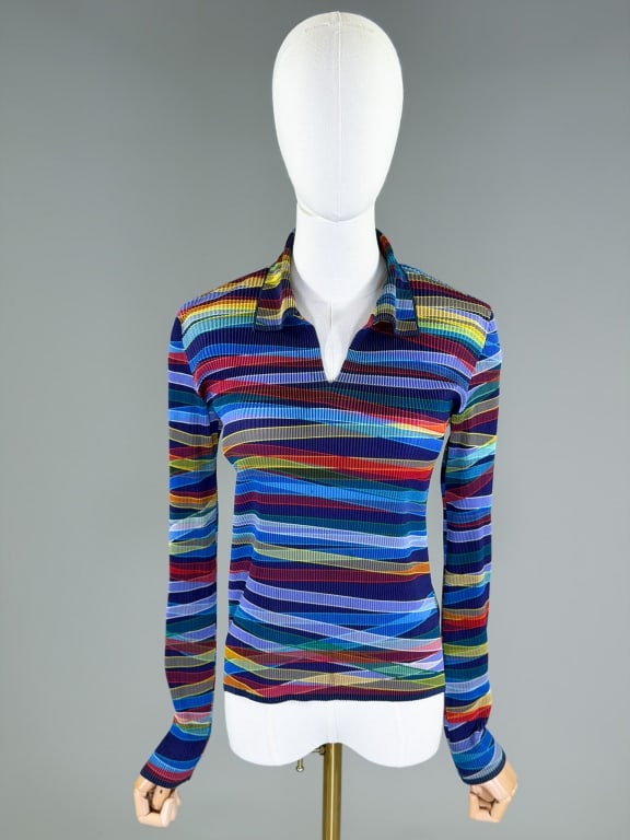 Vintage 1990s Issey Miyake Fete Pleated Shirt Top: Vintage 1990s Issey Miyake Fete Pleated Shirt Top having collar at neck with stretch throughout. Labeled Issey Miyake Fete, marked size 3. Measuring 36-60 inch bust, 22 inches long, 24 inch sleeve len