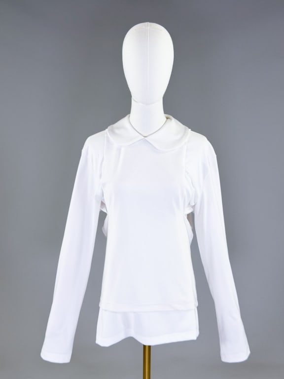 Comme Des Garcons 2018 White Knit Shirt Top: Comme Des Garcons 2018 White Knit Shirt Top having Peter Pan collar at neck with double layered body and long and short sleeve options. Labeled size Medium. Measuring 34-44 inch bust, 27 inches long, 
