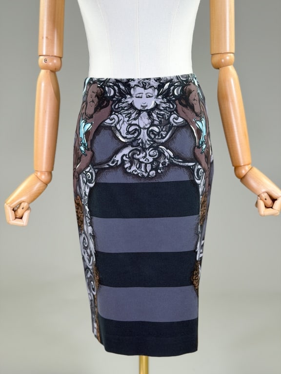 Vintage Prada Spring 2011 Stripe Pencil Skirt: Vintage Prada Spring 2011 Stripe Pencil Skirt having side zip closure and print throughout, fully lined. Labeled Prada Milano, marked size 40. Measuring 26 inch waist, 22 inches long. Look 8 from Spri