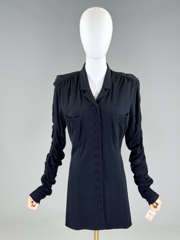 Vintage 1990s Lagerfeld Knit Ruched Blazer Dress: Vintage 1990s Lagerfeld Knit Ruched Blazer Dress having notched lapel collar with single breasted button front closure and two front breast pockets, ruched sleeves and ruched center back seam. Labeled