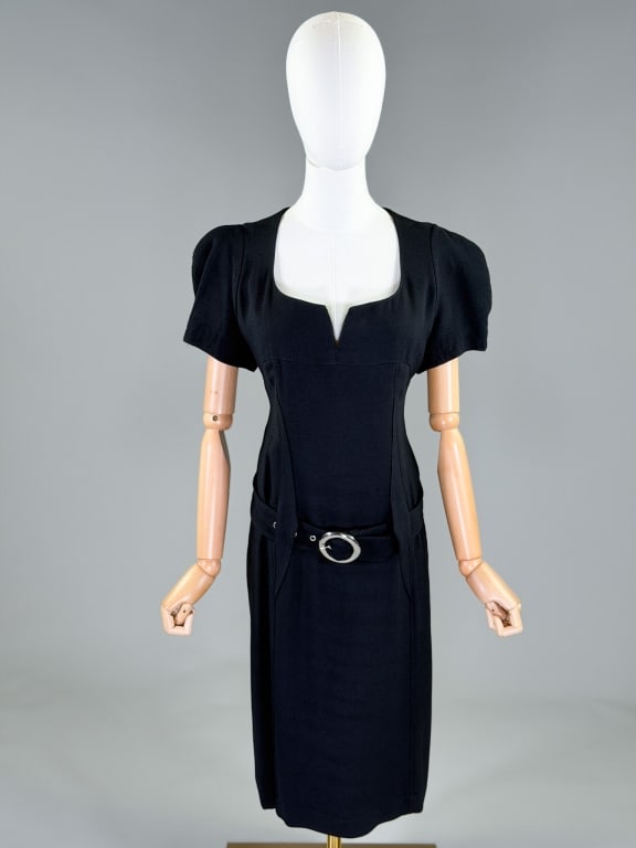 Vintage 1990s Thierry Mugler Crepe Cocktail Dress: Vintage 1990s Thierry Mugler Crepe Cocktail Dress having cap sleeves with belt at waist, back pockets and back snap closure, fully lined. Labeled Thierry Mugler Paris, marked size 40. Measuring 40 inc