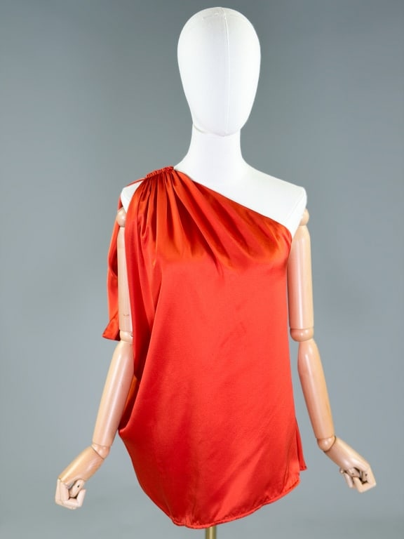 Vintage Lanvin Silk Draped Blouse Top: Vintage Lanvin Silk Draped Blouse Top having draped detail through shoulder and body. Measuring free bust, 17 inches long, 10 inch sleeve length. From the lifetime collection, fashion archive and busi