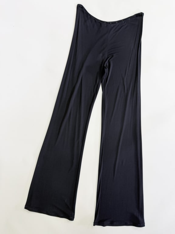 Vintage 1990s Jean Paul Gaultier Jersey Pants: Vintage 1990s Jean Paul Gaultier Jersey Pants having stretch throughout and zip at side. Labeled Jean Paul Gaultier Femme - marked size US 10. Measuring 32 inch waist, 10 inch rise, 36 inch inseam. Fr