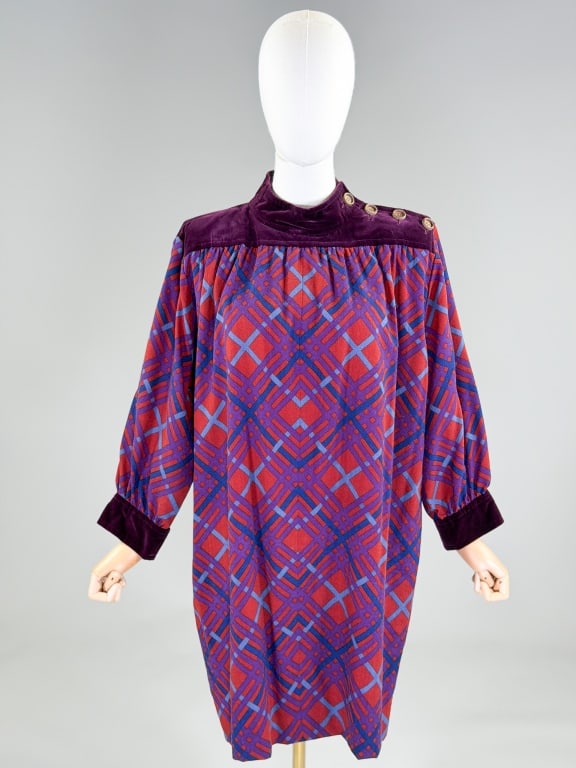 Vintage 1970's Yves Saint Laurent Plaid Tent Dress: Vintage 1970's Yves Saint Laurent Plaid Tent Dress having velvet yoke detail at shoulders with button closure and pockets at sides, fully lined. Labeled Saint Laurent, Rive Gauche. Marked size 38. Mea