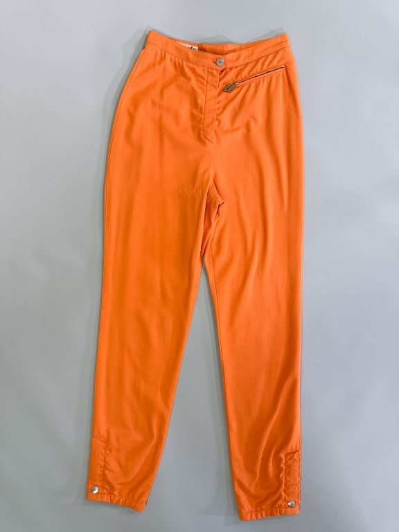 Vintage 1980s Hermes Paris Cotton Trousers Pants: Vintage 1980s Hermes Paris Cotton Trousers Pants having zip front closure with front zippered pocket and snap cuffs at ankle hem. Labeled Hermes Paris, marked size 36. Measuring 26 inch waist, 13 inch