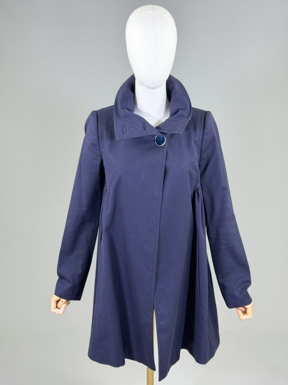 Vintage 2000s Stella McCartney Cotton Swing Jacket: Vintage 2000s Stella McCartney Cotton Swing Jacket having button closure at neck with open front. Marked size 38. Measuring 31 inches long, 25 inch sleeve length. From the lifetime collection, fashion