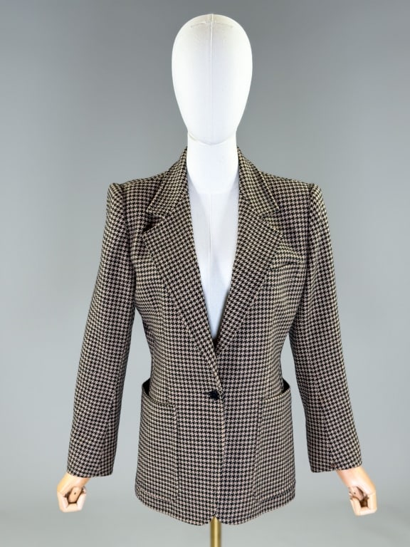 Vintage Guy Laroche Houndstooth Wool Blazer Jacket: Vintage Guy Laroche Houndstooth Wool Blazer Jacket having notched lapel collar, single breasted button front closure, and two front patch pockets, fully lined throughout. Labeled Diffusion Guy Laroche