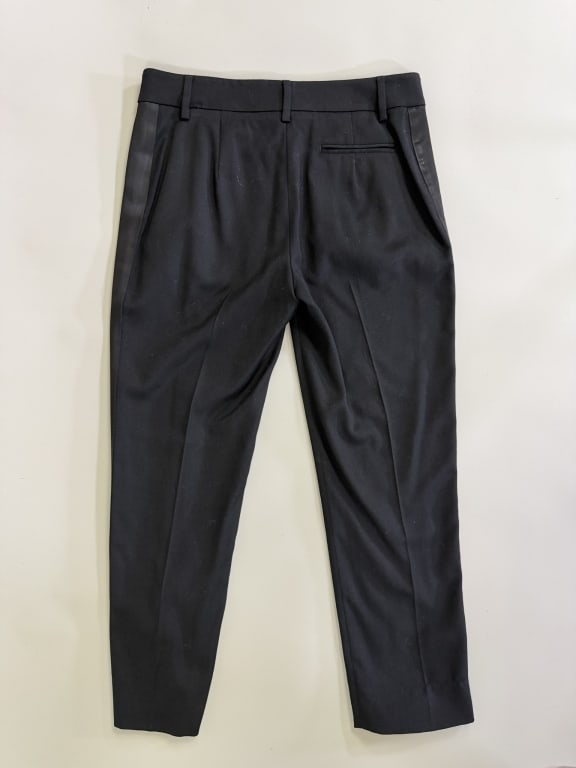 Vivienne Westwood Red Label Wool Tuxedo Pants: Vivienne Westwood Red Label Wool Tuxedo Pants having zip front closure with tuxedo stripe down side with two side pockets and one back pocket. Labeled Vivienne Westwood Red Label - marked size 42. Mea