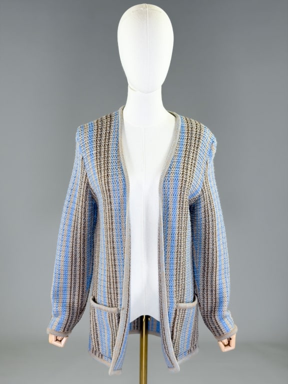Vintage 1970s Yves Saint Laurent Knit Cardigan: Vintage 1970s Yves Saint Laurent Knit Cardigan Sweater having open front with two front pockets. Marked size 3. Measuring 30 inches long, 25 inch sleeve length. From the lifetime collection, fashion a