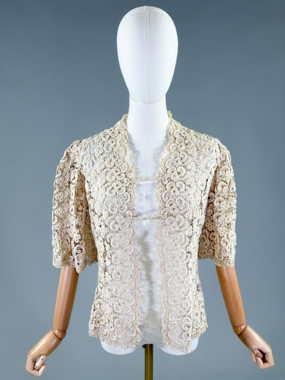 Antique Edwardian Irish Crochet Cotton Lace Jacket: Antique Edwardian Irish Crochet Cotton Lace Jacket having hook closure at front. Measuring one size fits most, 22 inches long, 13 inch sleeve length. From the lifetime collection, fashion archive and 