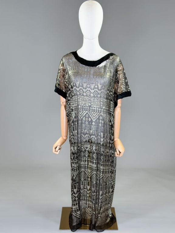 Antique 1920s Assuit Metal Kaftan Dress: Antique 1920s Assuit Metal Kaftan Dress having hammered metal details throughout. Measuring free bust and waist, 46 inches long, 10 inch sleeve length. Wear throughout as shown. From the lifetime coll