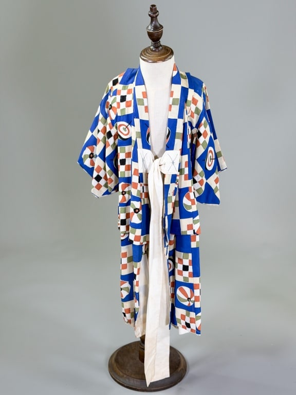 Vintage 1940s Japanese Children's Kimono Robe: Vintage 1940s Japanese Children's Kimono Robe having checkerboard print throughout with tie at front. Measuring 28 inches long, 8 inch sleeve length. General wear and holes as shown throughout. From t