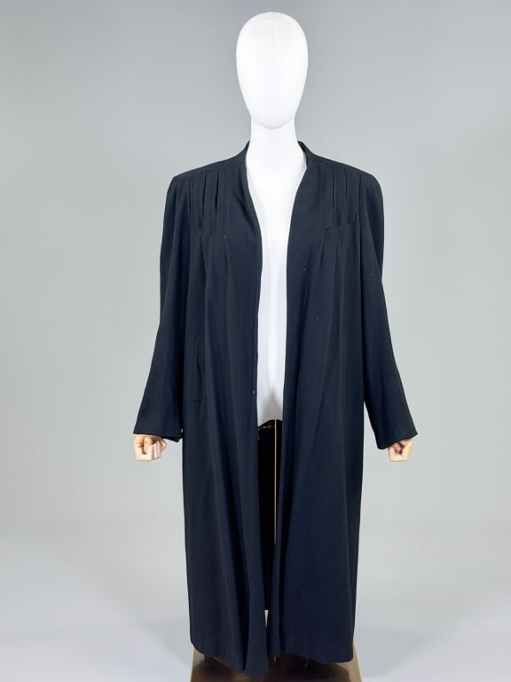 Vintage 1940s Black Wool Swing Coat Jacket: Vintage 1940s Black Wool Swing Coat Jacket having open front with two front pockets. Measuring one size fits most, 45 inches long, 24 inch sleeve length. General wear as shown throughout. From the lif