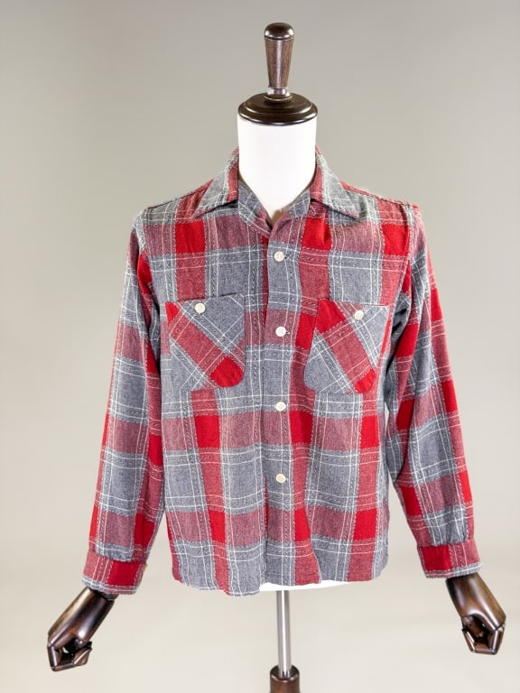 Vintage 1950's Wool Plaid Loop Collar Shirt: Vintage 1950's Wool Plaid Loop Collar Shirt having camp collar at neck with button front closure and two front patch pockets. Labeled Ensenada, marked size small 14-14.5. Measuring 42 inch chest, 25 i