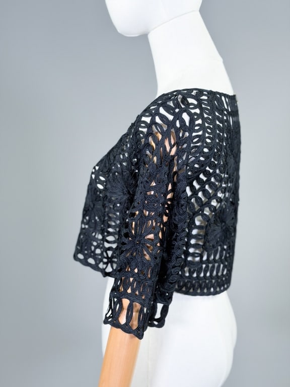 Vintage 1950s Ribbon Tape Lace Bolero Jacket: Vintage 1950s Ribbon Tape Lace Bolero Jacket having hook closure at neck with open front. Measuring 14 inches long, 12 inch sleeve length. From the lifetime collection, fashion archive and business in