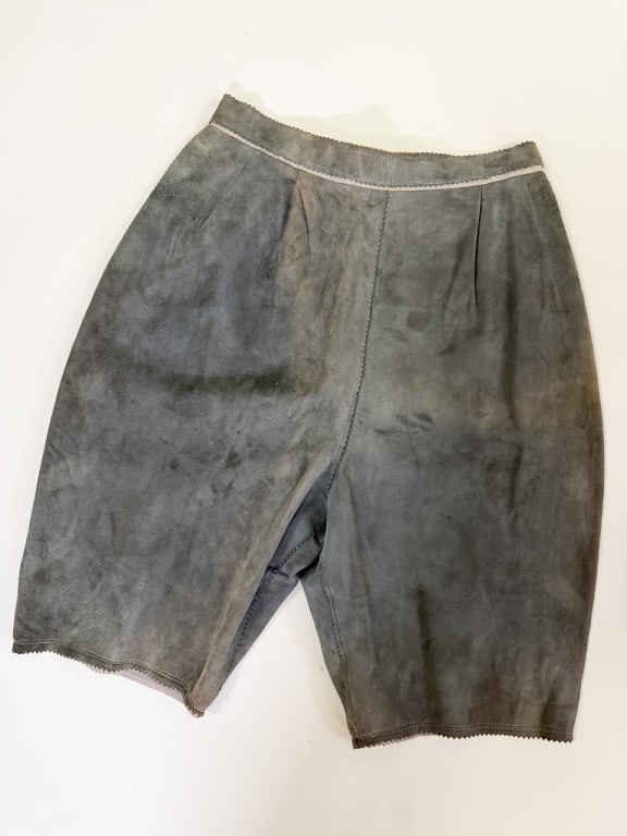 Vintage 1950s Tina Leser Suede Leather Shorts: Vintage 1950s Tina Leser Suede Leather Shorts having back zip closure and side pockets. Measuring 26 inch waist, 15 inch rise, 9 inch inseam. General wear as shown throughout. From the lifetime collec