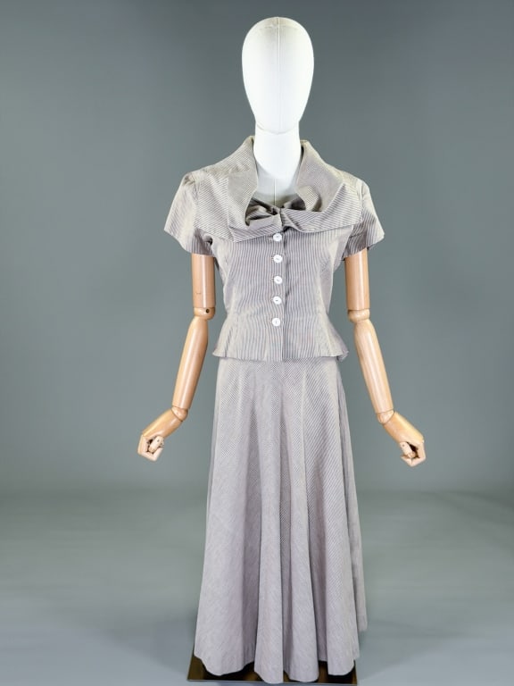 Vintage 1950s Stripe 2 PC Top Skirt Set: Vintage 1950s Stripe Two Piece Top Skirt Set with top having button front closure measuring 36 inch bust, 28 inch waist, 20 inches long, 6 inch sleeve length. Skirt with center back zip closure, 26 in
