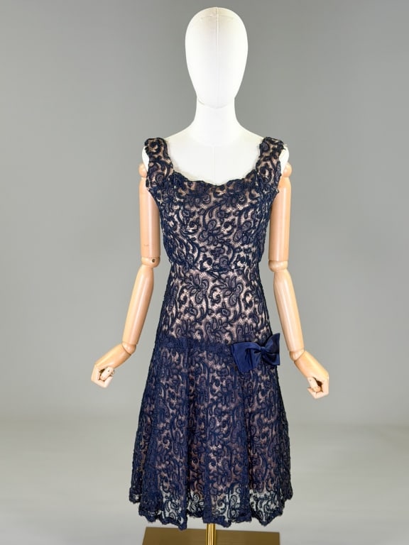 Vintage 1950s Lace Cocktail Fit & Flare Dress: Vintage 1950s Lace Cocktail Fit & Flare Dress having center back zip closure. Measuring 36 inch bust, 26 inch waist, 40 inches long. General wear throughout as shown. From the lifetime collection, fas