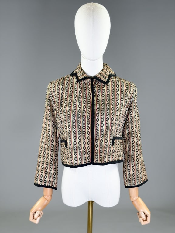 Vintage 1950s Henri Bendel Woven Stripe Jacket: Vintage 1950s Henri Bendel Woven Stripe Jacket having button front closure with two front pockets. Measuring 36 inch bust, 16 inches long, 19 inch sleeve length. From the lifetime collection, fashion 