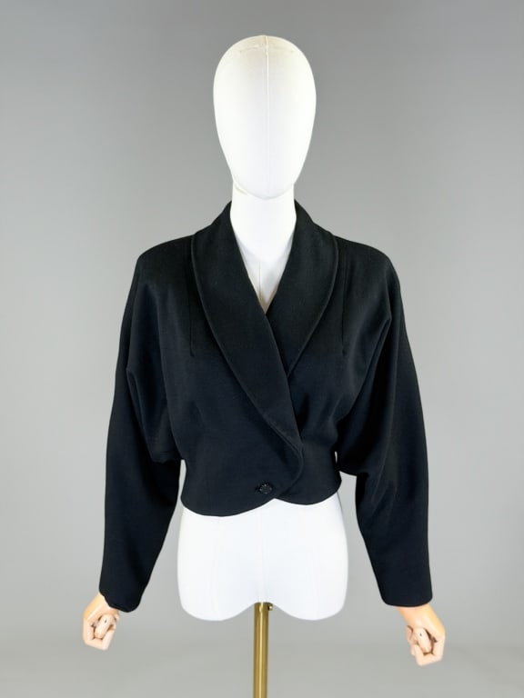Vintage 1950s Wool Bat Wing Scalloped Jacket: Vintage 1950s Wool Bat Wing Scalloped Jacket having button front closure. Measuring free bust, 28 inch waist, 17 inches long, 20 inch sleeve length. From the lifetime collection, fashion archive and b