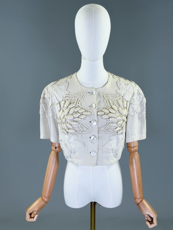 Vintage 1950s Linen Blouse w Antique Trim Accents: Vintage 1950s Linen Blouse with Antique Trim Accents having cropped style with button front closure and antique applique accents throughout. Measuring 38 inch bust, 34 inch waist, 16 inches long, 10 i