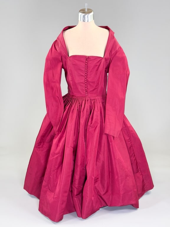 Vintage 1950s Ruffolo-Mangone Silk Cocktail Dress: Vintage 1950s Ruffolo-Mangone Silk Cocktail Dress having button front and side zip closures with pleated waistline and deep neckline. Measuring 34 inch bust, 26 inch waist, 46 inches long, 23 inch sle