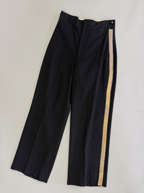 Vintage 1950s Wool Metallic Tuxedo Stripe Trousers: Vintage 1950s Wool Metallic Tuxedo Stripe Trousers having zip front closure with two front pockets and lame metallic tuxedo stripe down side seams. Measuring 30 inch waist, 14 inch rise, 28 inch insea