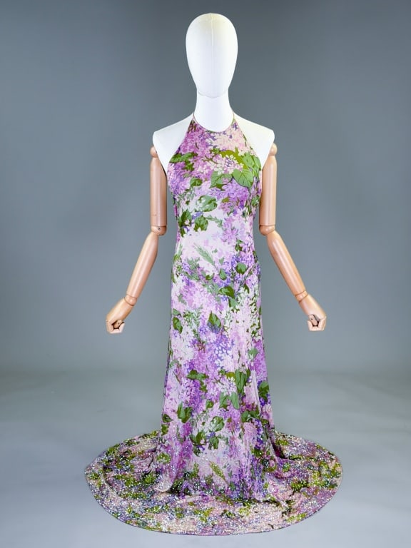 Vintage 1960s Ken Scott Silk Sequin Halter Dress: Vintage 1960s Ken Scott Silk Floral Sequin Halter Dress having halter neckline with sequin details at hem and side zip closure, fully lined. Bias cut and knit with stretch throughout. Labeled Ken Scot