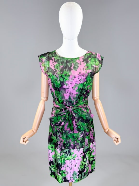 Vintage 1960s Samuel Winston Floral Chiffon Dress: Vintage 1960s Samuel Winston Floral Chiffon Dress having rounded neckline with sleeveless armholes and button, hook, and zip closure at center back. Labeled Samuel Winston by Roxane. Measuring 38 inch