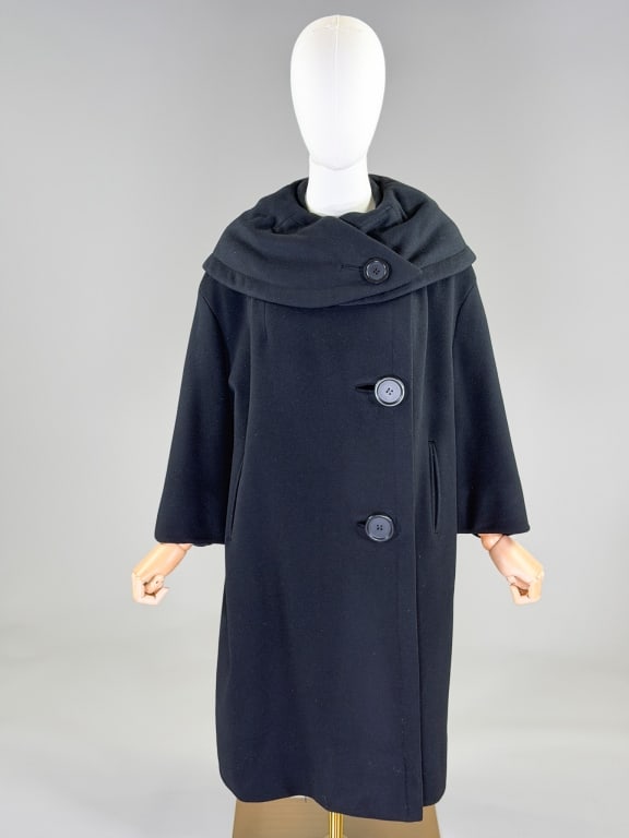 Vintage 1960s Martha West Wool Mod Swing Coat: Vintage 1960s Martha West Wool Mod Swing Coat having shawl collar at neck with button front closure and two front pockets, fully lined. Measuring 50 inch bust, 41 inches long, 18 inch sleeve length. F