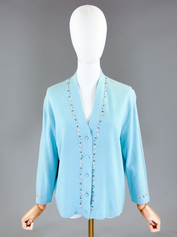 Vintage 1960s Embroidered Knit Cardigan Sweater: Vintage 1960s Embroidered Knit Cardigan Sweater having embroidery throughout with button front closure. Labeled Louisa Spagnoli. Measuring 44 inch bust, 23 inches long, 19 inch sleeve length. General 