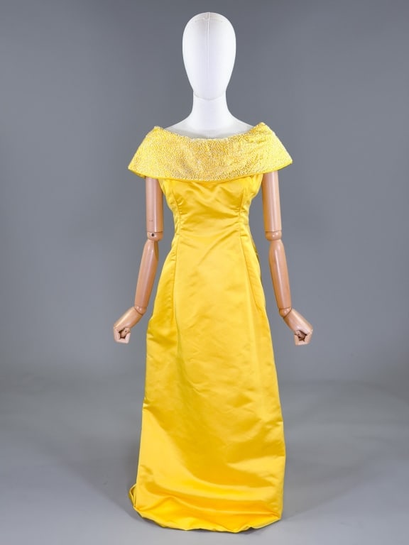 Vintage 1960s Lisette Beaded Silk Satin Gown: Vintage 1960s Lisette Beaded Silk Satin Gown having beaded collar with center back zip closure. Labeled Listte Original. Measuring 36 inch bust, 32 inch waist, 51 inches long. From the lifetime collec
