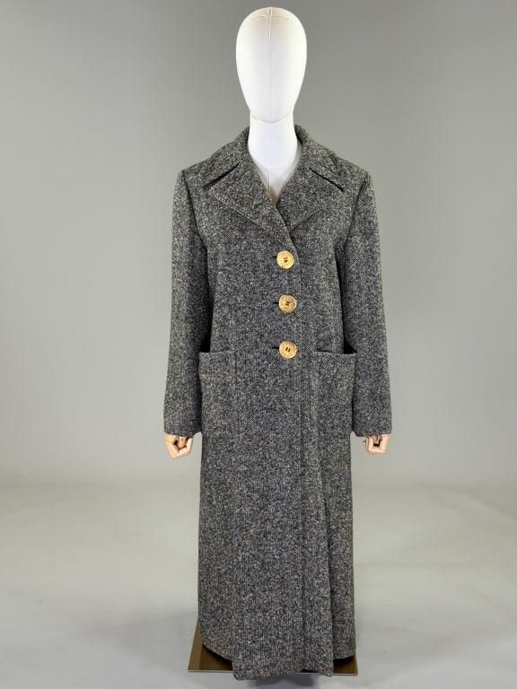 Vintage 1970s Wool Mod Button Front Over Coat: Vintage 1970s Wool Mod Button Front Over Coat having notched lapel collar with single breasted button front closure and two front patch pockets, fully lined throughout. Measuring 40 inch bust, 40 inch