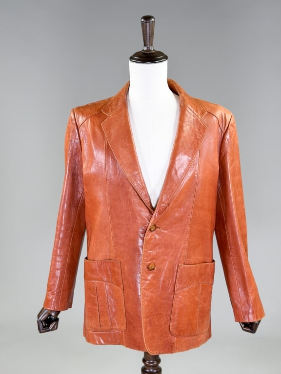Vintage 1970s Wilsons Leather Blazer Jacket: Vintage 1970s Wilsons Leather Blazer Jacket having notched lapel collar with single breasted button front closure, two front patch pockets, fully lined throughout. Labeled Wilsons Suede & Leather. 46 