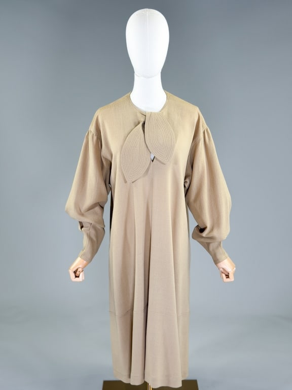Vintage 1970s Jean Muir Wool Crepe Mod Tent Dress: Vintage 1970s Jean Muir Wool Crepe Mod Tent Dress having stitched tie at neck with two side pockets, no closure, slides over head. Labeled Jean Muir, marked size 10. Measuring 44 inch bust, 46 inch wa