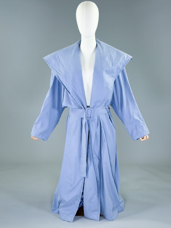 Vintage 1980s Laurel Shawl Collar Trench Coat: Vintage 1980s Laurel Escada Shawl Collar Trench Coat Jacket having shawl collar at neck, belt at waist, two pockets at side, fully lined in quilted fabric. Labeled Laurel - marked size 34. Measuring o