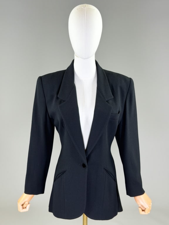 Vintage 1980s Anne Klein Wool Draped Blazer Jacket: Vintage 1980s Anne Klein Wool Draped Blazer Jacket having notched lapel collar with single breasted button front closure and two front pockets, fully lined throughout with draped bustle back peplum de