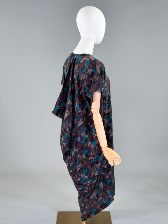 Vintage 1980s Callaghan Silk Draped Shift Dress: Vintage 1980s Callaghan Silk Draped Shift Dress having loose, oversized fit with draped back detail and back neck button closure. Labeled Callaghan - marked size 42. Measuring 50 inch bust, 50 inch wa