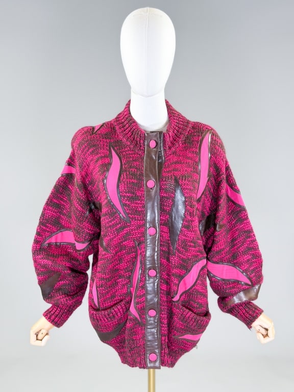 Vintage 1980s Louis Feraud Knit Cardigan Sweater: Vintage 1980s Louis Feraud Leather Applique Knit Cardigan Sweater having button front closure with two front pockets and leather appliques and details throughout. Labeled Louis Feraud - marked size US